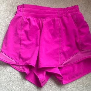 these fabulous lululemon shorts are sonic pink color!! Great condition.